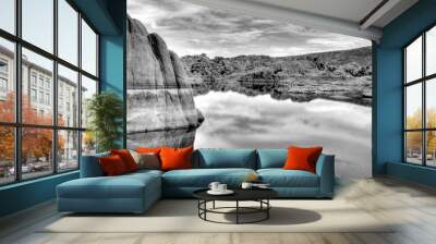 Watson Lake as the sky reflects on still glass like water in black and white  Wall mural