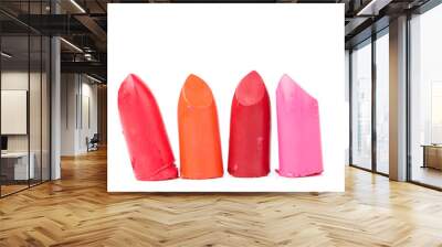 Lipstick slices collection. Close up of four slices lipstick on white background Wall mural