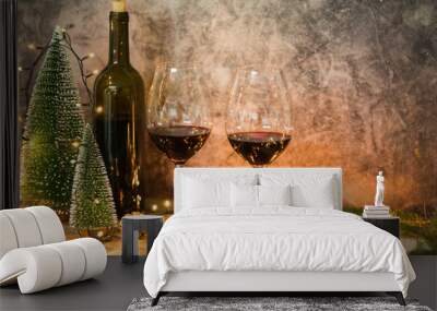 Red wine, bottle and christmas lights background Wall mural