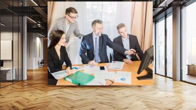 business partners discussing documents and ideas at meeting Wall mural