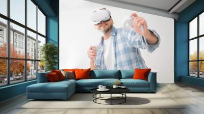 man wearing virtual reality vr headset. vr for gaming. man play game in vr glasses. Wall mural