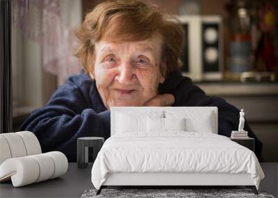 portrait of old woman close up. Wall mural