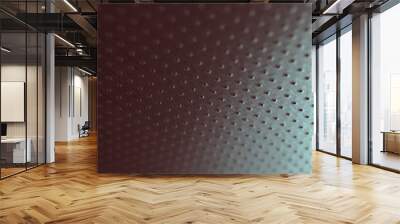 Perforated aluminum surface with many holes, hanging from above like a ceiling. Perforation rows go into the distance and form a perspective. Tinted red and green metal background. Dark wallpaper Wall mural