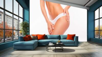 Beautiful slim woman body isolated on white background Wall mural