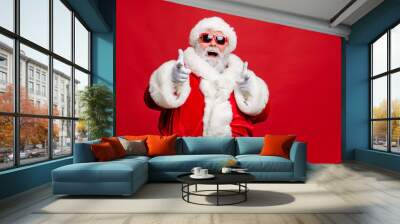 Choose winter season sales. Close up photo of cool stylish trendy santa indicate discount shopping bargain wear eyeglasses eyewear cap hat isolated over red background Wall mural