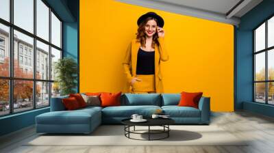 Close up photo beautiful amazing funky she her toothy lady arms hands pocket perfect look tourism shopping store mall wear specs formal-wear costume suit isolated yellow bright background Wall mural