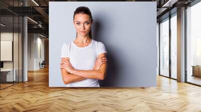 Close up photo beautiful amazing she her no smiling lady perfect appearance crossed self-confident easy-going listening good news sure such results wear casual white t-shirt isolated grey background Wall mural