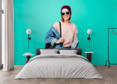 Close up photo beautiful funny her she lady modern fashionable look ready walk park meet friends fellows wear specs hat casual jeans denim pastel t-shirt clothes isolated teal turquoise background Wall mural