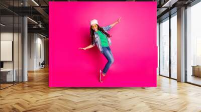 Close up photo beautiful little age she her curly lady cool arms hands action motion disco party amazing look long hairdo wear yellow specs casual jeans denim jacket isolated pink bright background Wall mural