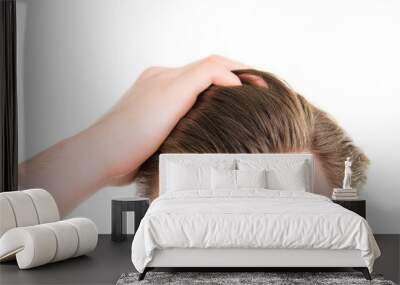 Close up photo of man combing his hair with fingers Wall mural