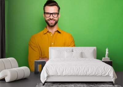 Close-up portrait of his he nice attractive cheerful cheery bearded guy in casual formal shirt office employee folded arms isolated on bright vivid shine vibrant green color background Wall mural