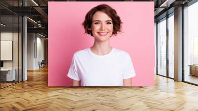 Close-up portrait of nice attractive cheerful brown-haired girl wearing casual comfy tshirt isolated over pink pastel color background Wall mural