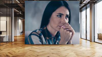 Close up side profile photo beautiful she her lady displeased hopeless hands palms together nerves operation husband hospital clinic wear checkered plaid shirt comfort flat house living room indoors Wall mural