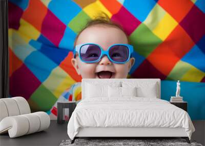 Created by generative AI portrait of happy positive funny baby wearing stylish big colored sunglasses Wall mural