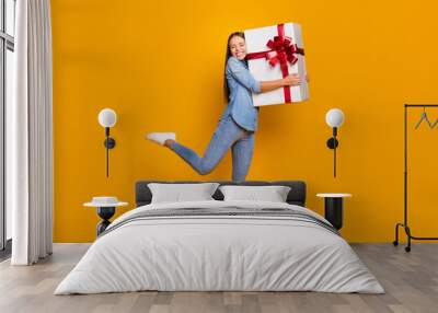 Full body photo energetic content girl celebrate 8-march 14-february day hug big white gift box red ribbon she get friends family wear good look shirt isolated bright shine color background Wall mural