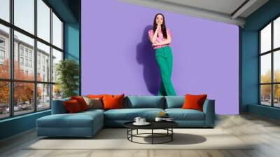 Full body portrait of nice young woman contemplate wear checkered t-shirt isolated on violet color background Wall mural