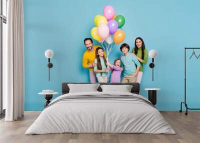 Full length body size view of nice attractive lovely charming cheerful cheery big full family celebrating occasion festal decoration isolated on bright vivid shine vibrant blue color background Wall mural