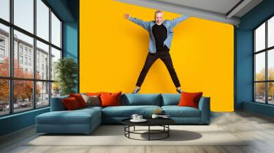 Full length photo of cool granddad jump wear jacket pants isolated on yellow color background Wall mural