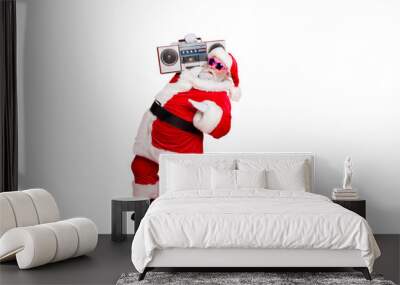 Full size photo of cool old stylish trendy santa claus in eyewear eyeglasses dancing holding audio sound cassette isolated over red background Wall mural