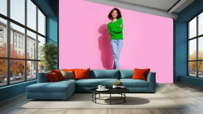 Full size photo of pretty young girl crossed hands confident wear trendy green outfit isolated on pink color background Wall mural