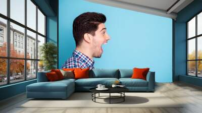 Half turned closeup photo studio portrait of handsome joking comic humorous he him freelancer work worker grimacing facial emotion expression isolated pastel background copyspace Wall mural