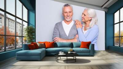 Happy excited lovely tender gentle cute elderly people are smiling and embracing, isolated on grey background Wall mural