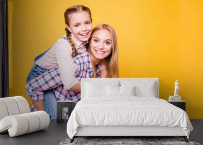 Laugh emotions long hair girlish pigtails checkered shirt concept. Side profile close up view portrait of two excited cheerful rejoicing cute sweet pretty older sisters isolated on bright background Wall mural