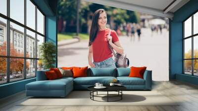 Nice charming attractive cute young cheerful smiling girl outdoo Wall mural