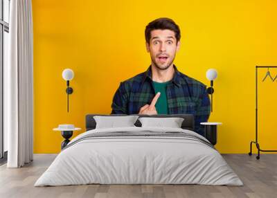 Photo of amazing guy indicating finger on his chest not believe everybody blaming him wear casual plaid shirt isolated yellow color background Wall mural