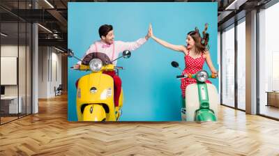 Photo of funky two people lady guy couple drive retro moped travelers traffic jam easy way clapping arms good job well-done formalwear vintage clothes isolated blue color background Wall mural