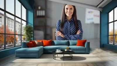 Photo of happy joyful confident young woman wear formalwear folded hands indoors in office workplace workstation Wall mural