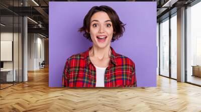 Photo of impressed millennial bob hairdo lady wear red shirt isolated on violet color background Wall mural