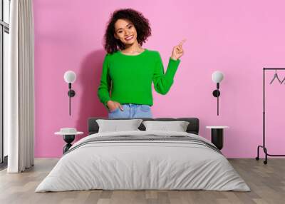 Photo of lovely adorable woman wear green stylish clothes empty space isolated on pink color background Wall mural