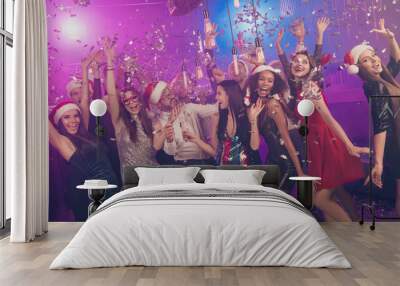 Photo of many crazy people cute lady hold wineglass dance falling confetti wear stylish outfit modern club indoors Wall mural