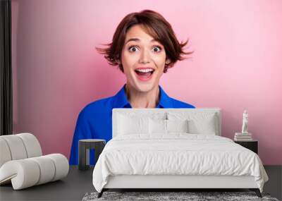 Photo of positive astonished person toothy smile open mouth cant believe isolated on pink color background Wall mural