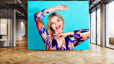 Photo of shiny attractive lady dressed retro clothes smiling empty space isolated blue color background Wall mural