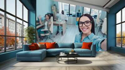 Photo of smart confident lady have learning career training blogging make selfie friend say hello in workspace Wall mural