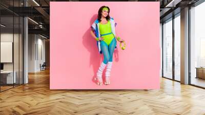 Photo of sporty lady trainer ride roller skates white listen energetic playlist headset isolated on pastel color background Wall mural