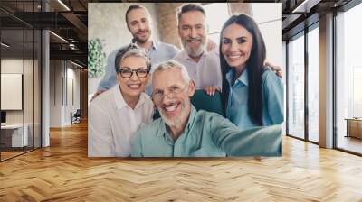 Photo of teamwork people working together video recording take selfie photo comfortable modern office loft room interior indoors workspace Wall mural