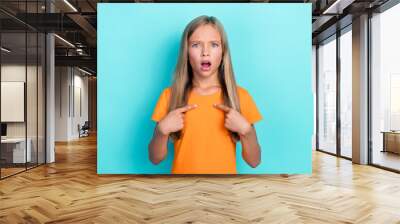 Photo of worried outraged girl pupil trendy outfit hands arm point herself negative shocked choice isolated on cyan color background Wall mural