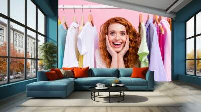 Photo of young girl happy positive smile enjoy shopping sale closet store isolated over pastel color background Wall mural