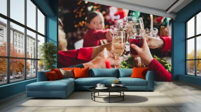 Photo portrait if family celebrating new year drinking wine champagne sitting at festive table tasty food Wall mural