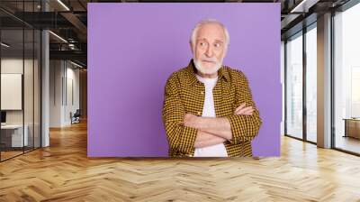 Photo portrait of concerned grandpa doubt not believe white hair wear trendy yellow plaid shirt isolated on lilac purple color background Wall mural