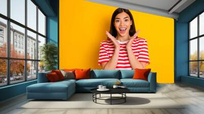 Portrait of astonished black hairdo lady raise opened hands wear red white isolated on yellow color background Wall mural