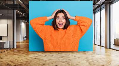 Portrait of attractive amazed cheerful girl sudden funny great news reaction isolated over bright blue color background Wall mural