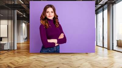 Portrait of charming lady look isolated over violet purple background Wall mural