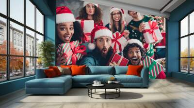 Portrait of company office workers make selfie hold surprise giftbox new year time loft office indoors Wall mural