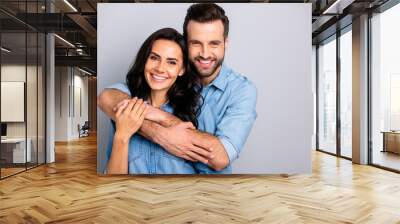 Portrait of cute adorable romantic fellows tender bonding best friends real soulmates enjoying each other placing arms around chest neck in blue denim shirts on grey background Wall mural