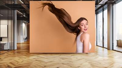 Portrait of cute funky lovely millennial funny funky pretty laughter look hairstyle salon procedure shampoo effect dressed top singlet isolated beige background Wall mural