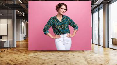 Portrait of gorgeous pleasant positive woman with bob hairstyle wear print blouse keep hands on waist isolated on pink color background Wall mural